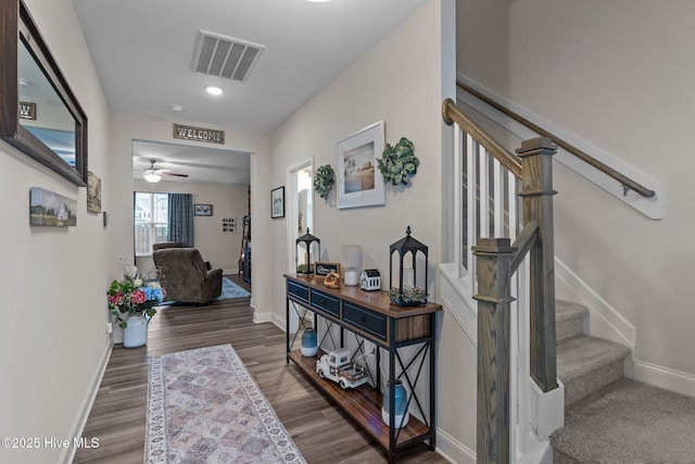 corridor featuring hardwood / wood-style floors