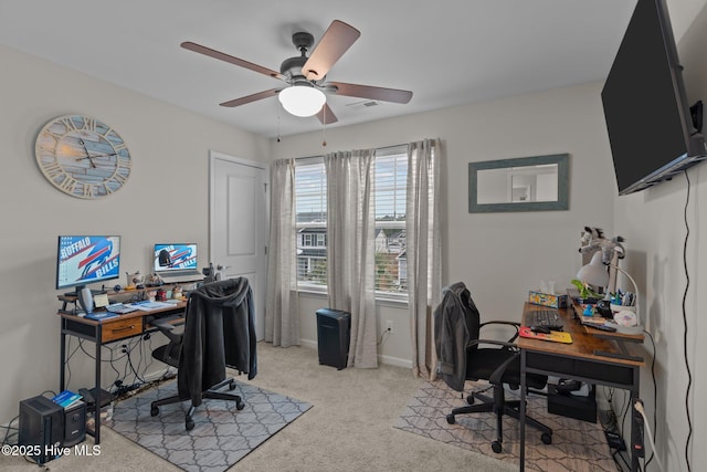 office space with ceiling fan and light colored carpet