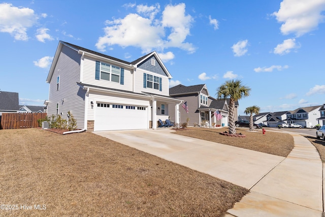 view of front of home with central AC unit, a garage, and a front lawn