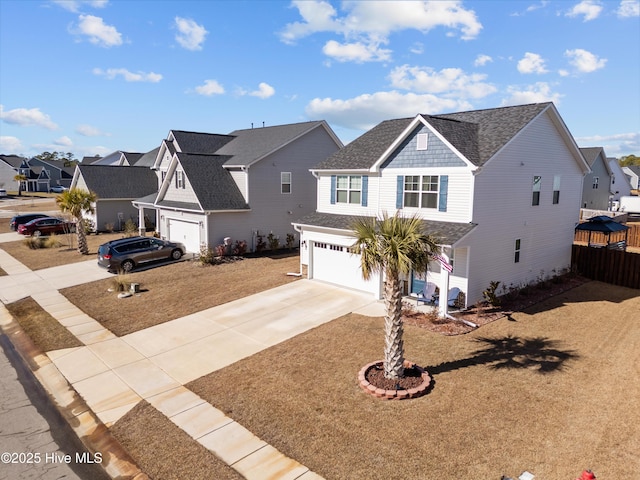 front facade with a garage and a front lawn