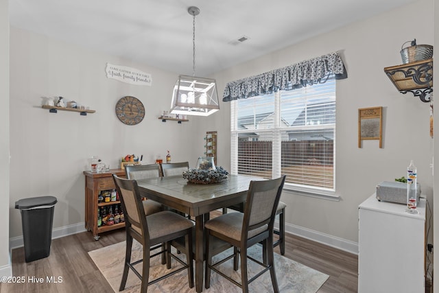 dining room featuring dark hardwood / wood-style floors