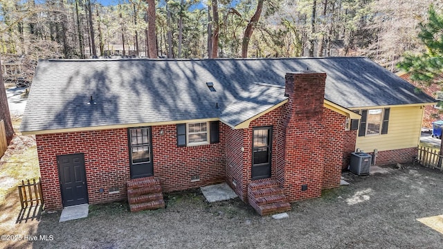 back of property featuring cooling unit