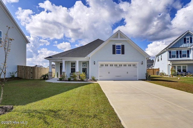 craftsman inspired home with a front lawn and a porch