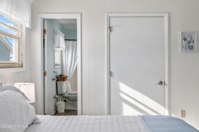 bedroom featuring connected bathroom