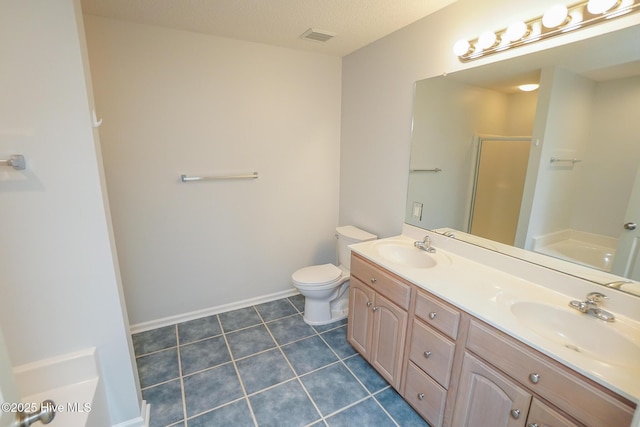 full bathroom featuring a shower stall, visible vents, a sink, and tile patterned floors