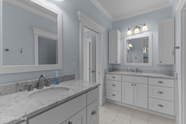 bathroom featuring tile patterned floors, vanity, and crown molding