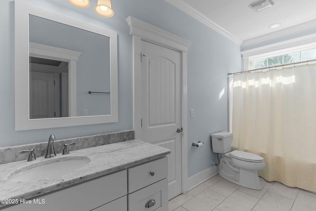 bathroom with crown molding, toilet, tile patterned floors, and vanity