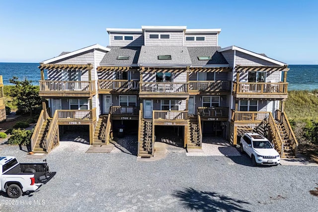 view of front of home featuring a water view