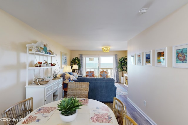 dining space featuring hardwood / wood-style floors