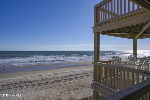 view of home's community with a view of the beach and a water view