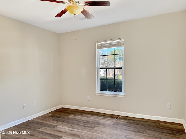 unfurnished room featuring hardwood / wood-style flooring and ceiling fan