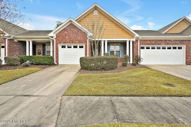 view of front of home with a garage and a front yard