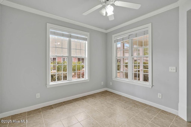 tiled empty room with plenty of natural light, ceiling fan, and ornamental molding