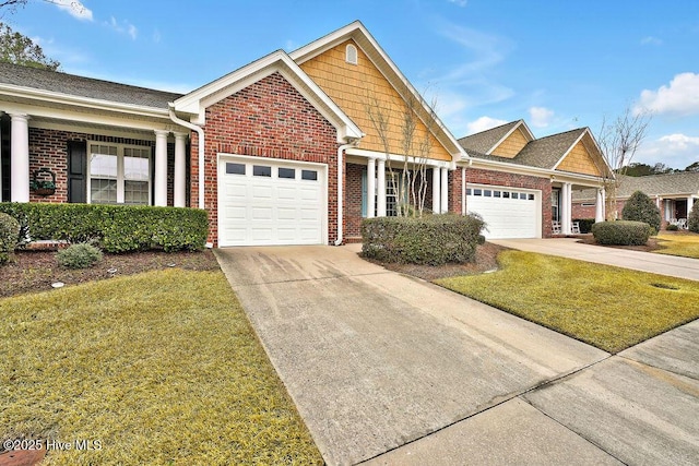 view of front of home with a garage and a front yard