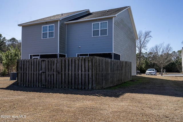 back of property featuring central air condition unit