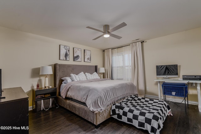 bedroom featuring dark wood-type flooring and ceiling fan