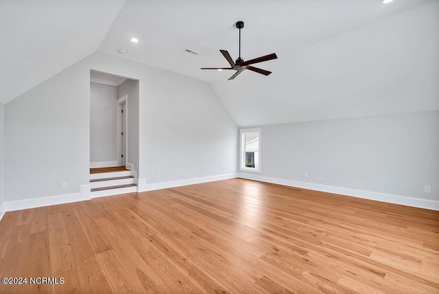 bonus room featuring ceiling fan, light wood-type flooring, and vaulted ceiling