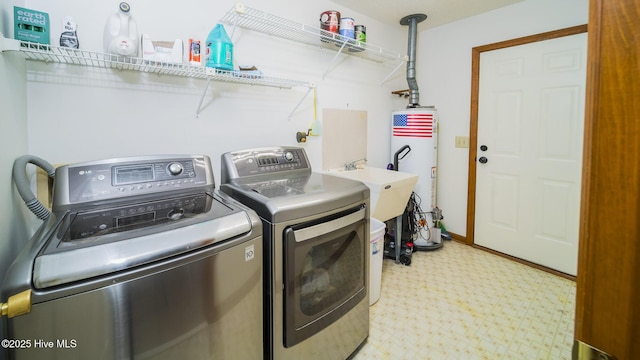 laundry area featuring washer and dryer and gas water heater