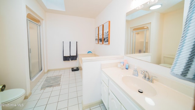 3 Bayberry Cir, Carolina Shores, NC 28467 - full bath featuring a stall shower, vanity, a skylight, and tile patterned floors
