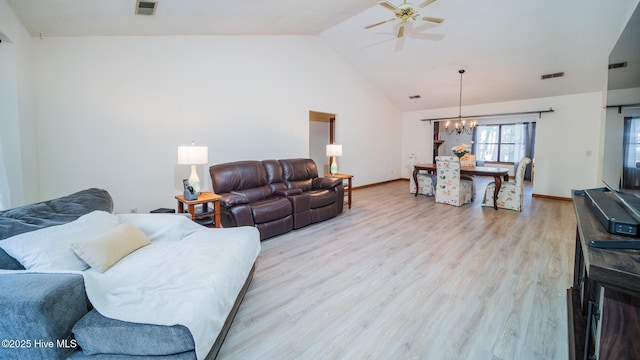 3 Bayberry Cir, Carolina Shores, NC 28467 - living area with light wood finished floors, a chandelier, ceiling fan, and high vaulted ceiling