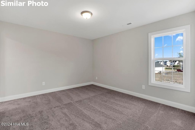 empty room with carpet floors