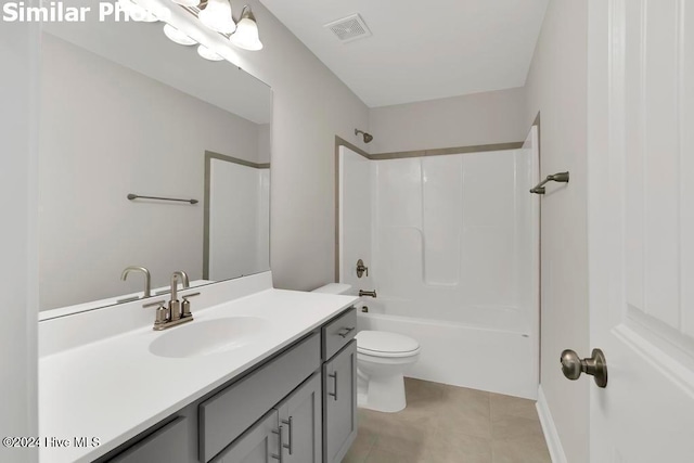 full bathroom with shower / bath combination, vanity, tile patterned floors, and toilet