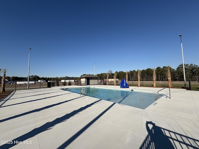 view of pool featuring a patio area