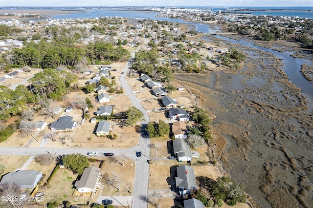 aerial view featuring a water view and a residential view