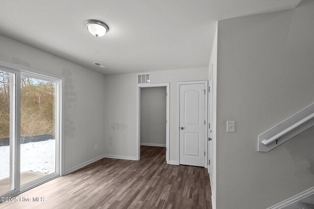 135 Chase Dr, Snow Hill, NC 28580 - kitchen with white cabinetry, light stone counters, a sink, light wood finished floors, and stainless steel appliances