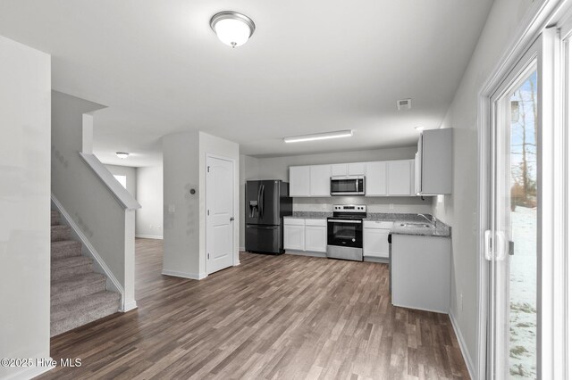 135 Chase Dr, Snow Hill, NC 28580 - empty room featuring baseboards, wood finished floors, and visible vents