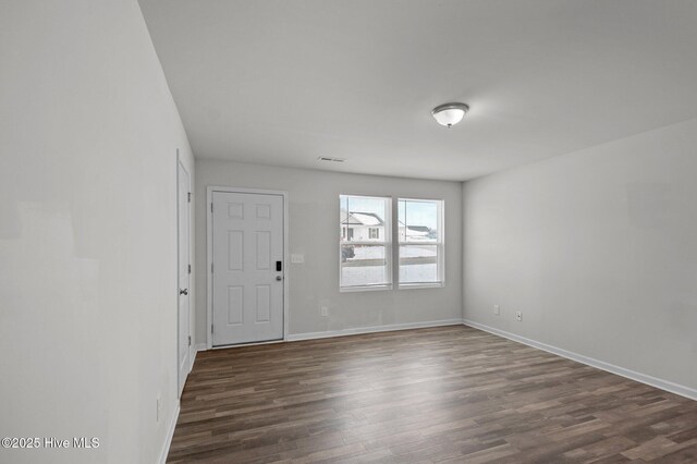 135 Chase Dr, Snow Hill, NC 28580 - empty room with baseboards and wood finished floors