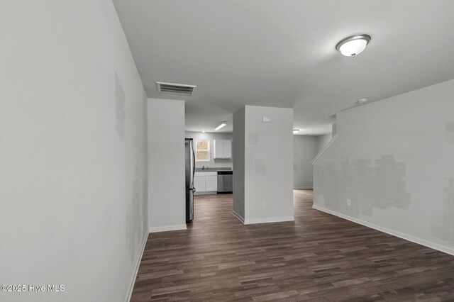 135 Chase Dr, Snow Hill, NC 28580 - unfurnished room featuring dark wood-type flooring and baseboards