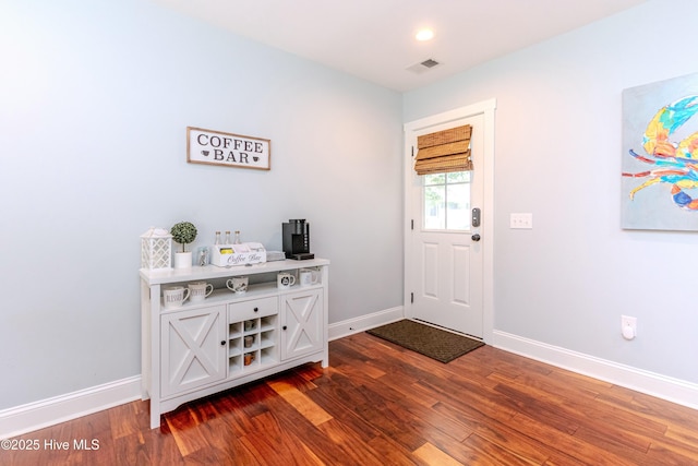 entrance foyer with dark wood-type flooring