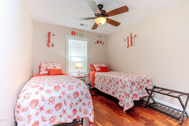 bedroom with hardwood / wood-style flooring and ceiling fan