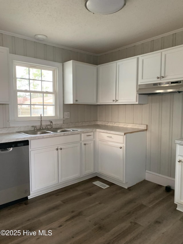 kitchen with dark wood-type flooring, white cabinets, dishwasher, and sink