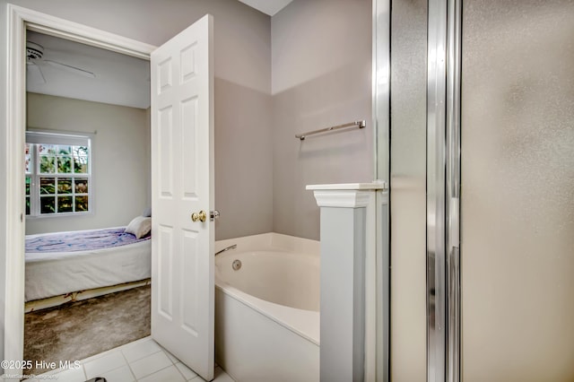 bathroom with ceiling fan, tile patterned flooring, and separate shower and tub