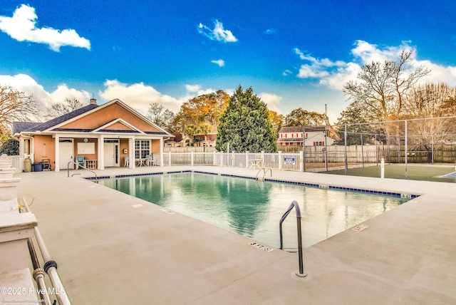 view of pool featuring a patio area