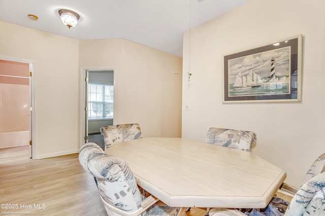 dining area with light hardwood / wood-style flooring