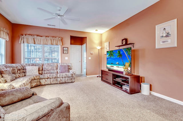 living room with carpet floors and ceiling fan