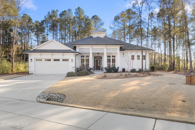 prairie-style home featuring a garage