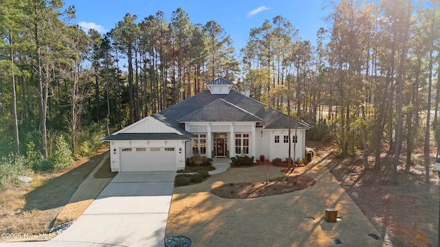 view of front of property with a garage