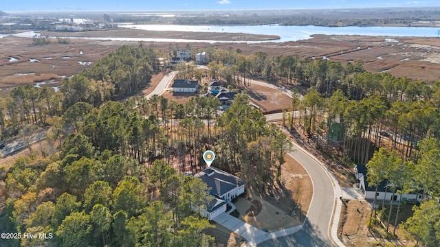 drone / aerial view featuring a water view