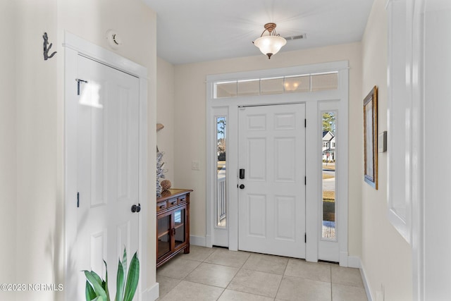 view of tiled foyer entrance