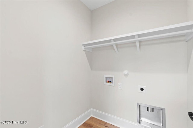 1665 Butterfly Knot Dr SW, Ocean Isle Beach, NC 28469 - laundry room featuring electric dryer hookup, washer hookup, light wood-type flooring, baseboards, and gas dryer hookup