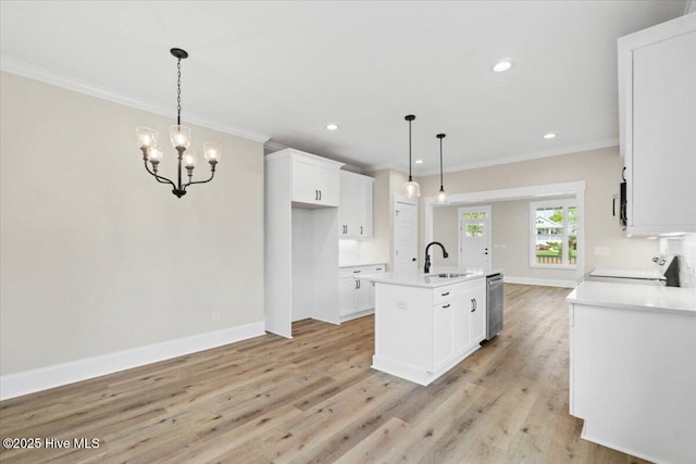 1665 Butterfly Knot Dr SW, Ocean Isle Beach, NC 28469 - kitchen featuring a sink, range, baseboards, white cabinets, and ornamental molding