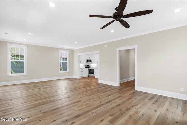 1665 Butterfly Knot Dr SW, Ocean Isle Beach, NC 28469 - unfurnished living room with ornamental molding, recessed lighting, light wood-style floors, a ceiling fan, and baseboards