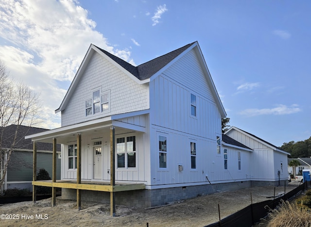 back of house with covered porch