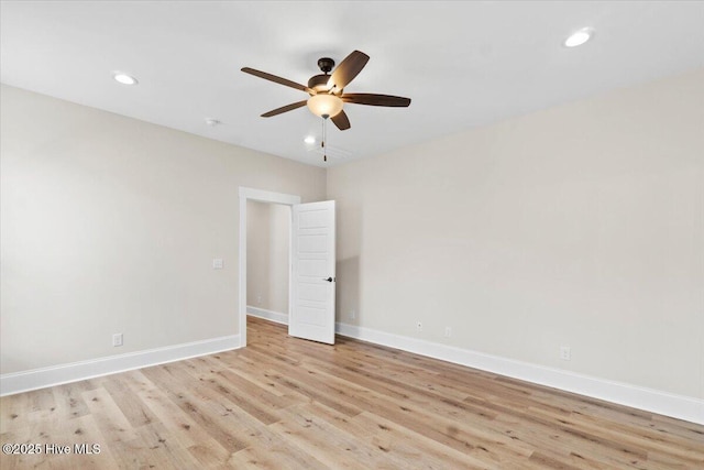 1665 Butterfly Knot Dr SW, Ocean Isle Beach, NC 28469 - empty room with a ceiling fan, light wood-type flooring, recessed lighting, and baseboards