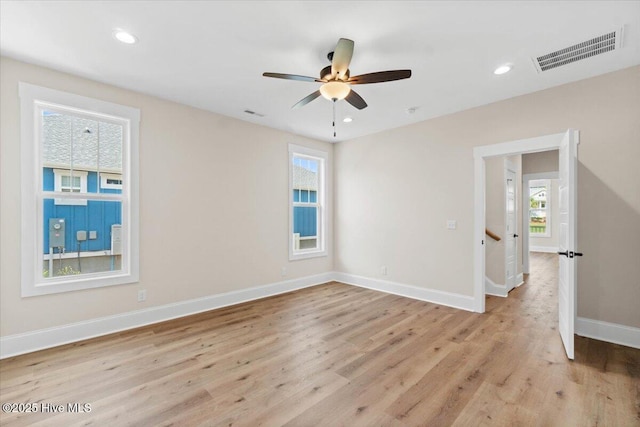 1665 Butterfly Knot Dr SW, Ocean Isle Beach, NC 28469 - unfurnished room featuring light wood-style flooring, baseboards, recessed lighting, and a ceiling fan