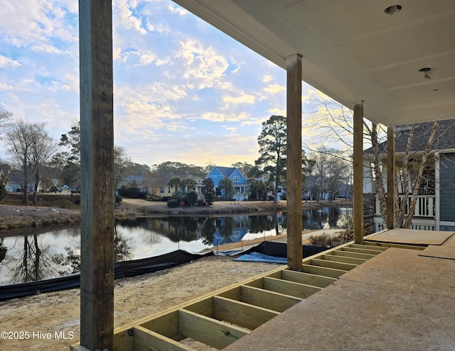 view of patio / terrace with a water view